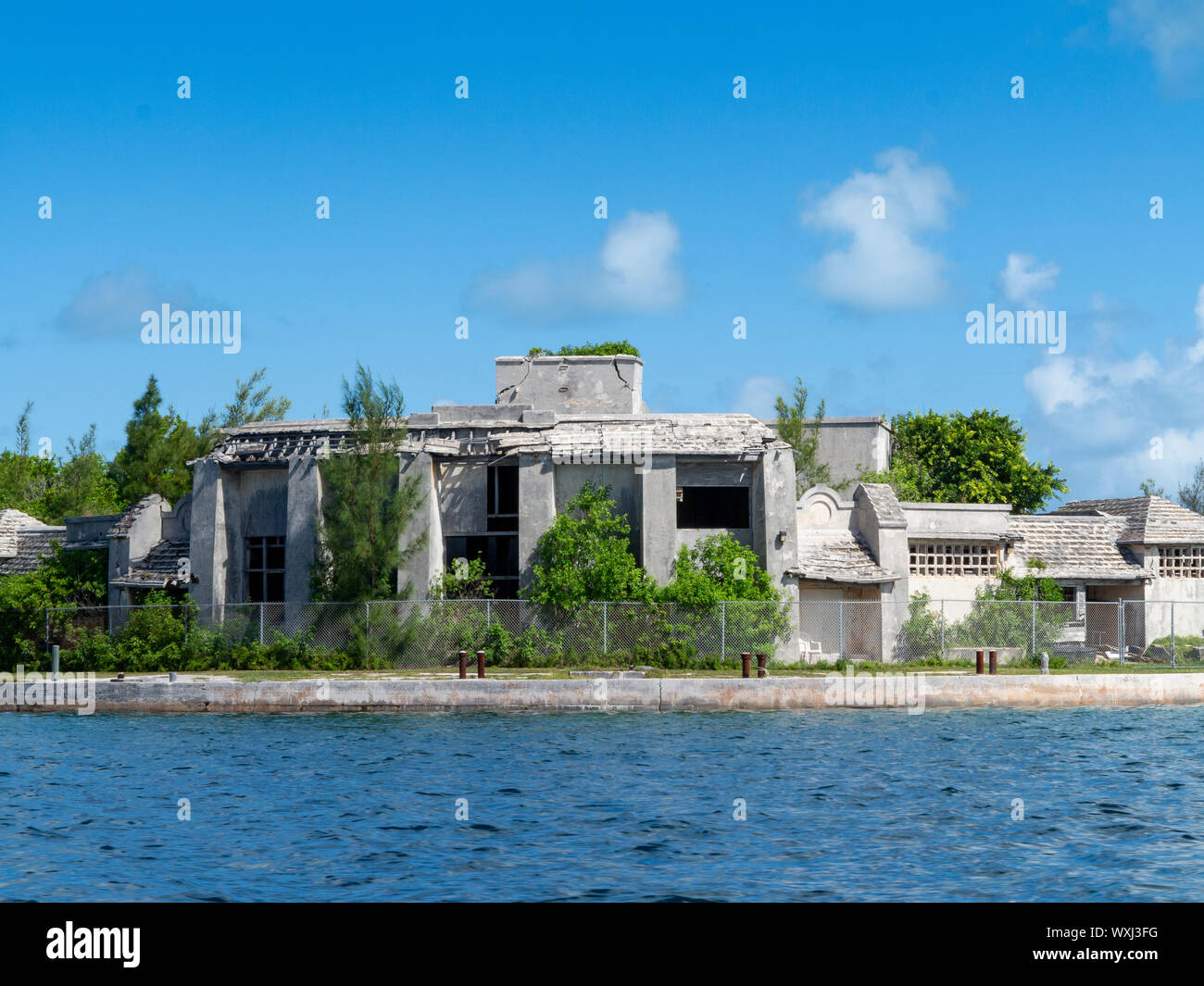Remains of an Imperial Airways air station with a strip of sea in front on Darrell's Island, Great Sound, Bermuda Stock Photo