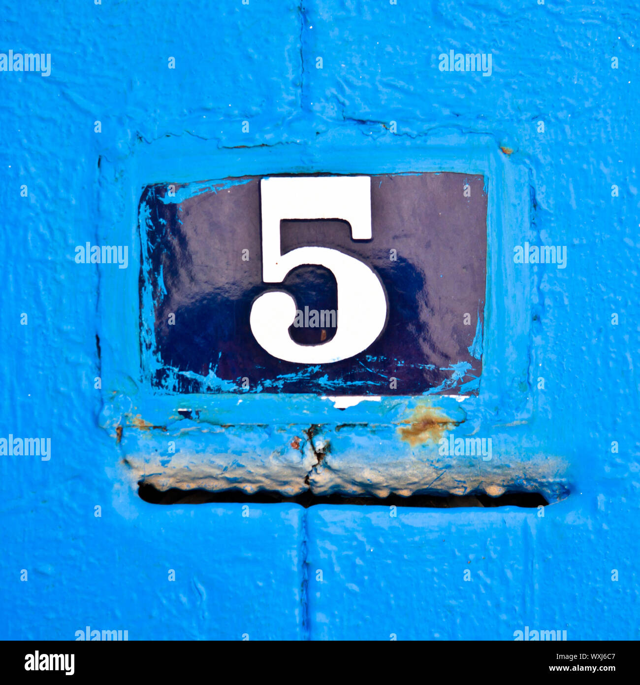 Street door number with the mail box slot Stock Photo - Alamy
