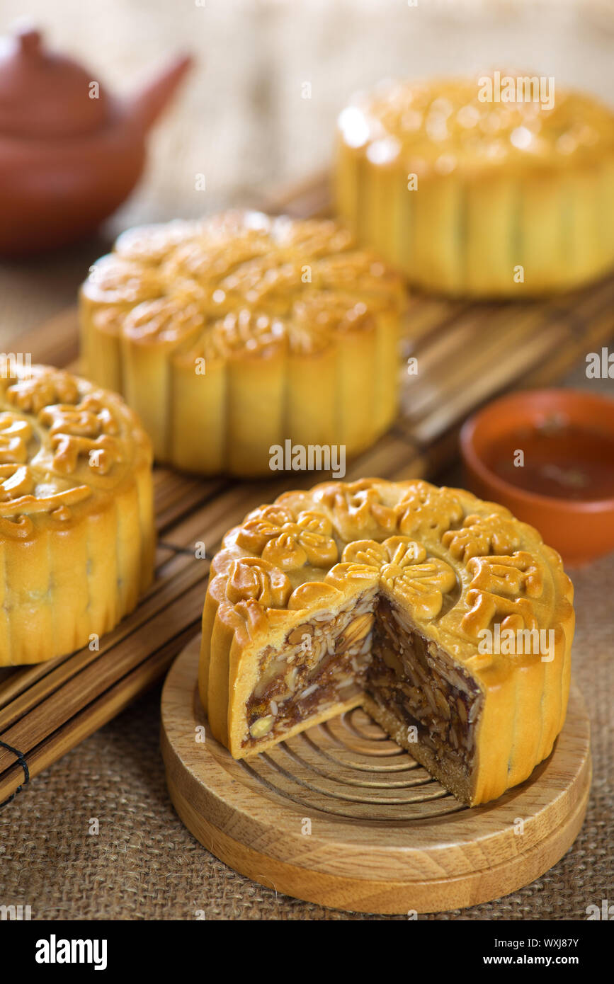 Chinese mid autumn festival foods. Traditional mooncakes on table ...