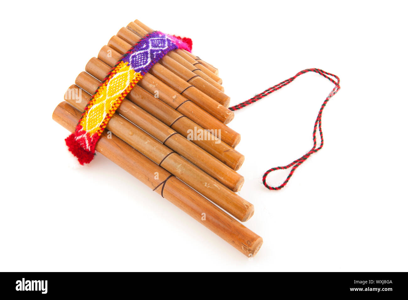 Peruvian pan flute or pipe isolated over white Stock Photo Alamy