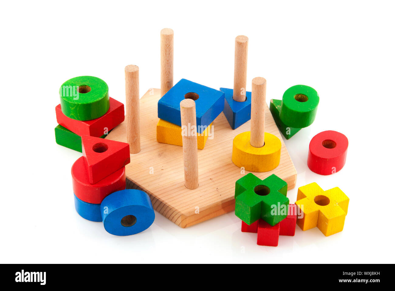 Wooden toys as a puzzle with different shapes Stock Photo - Alamy