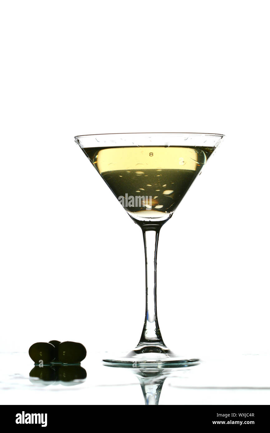martini splash on white bar background Stock Photo Alamy