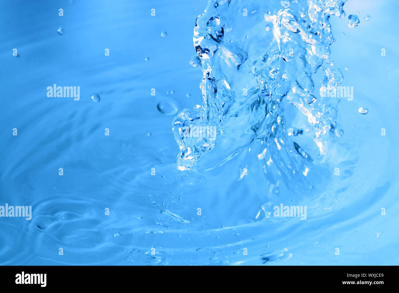 blue water splash macro close up Stock Photo - Alamy