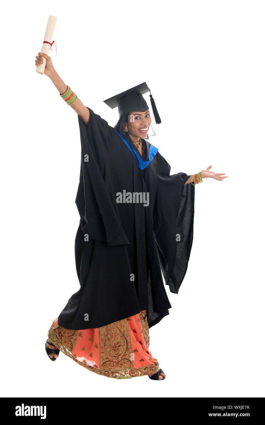 Indianized Graduation Robe Full length happy Indian university student in graduation gown and cap ...