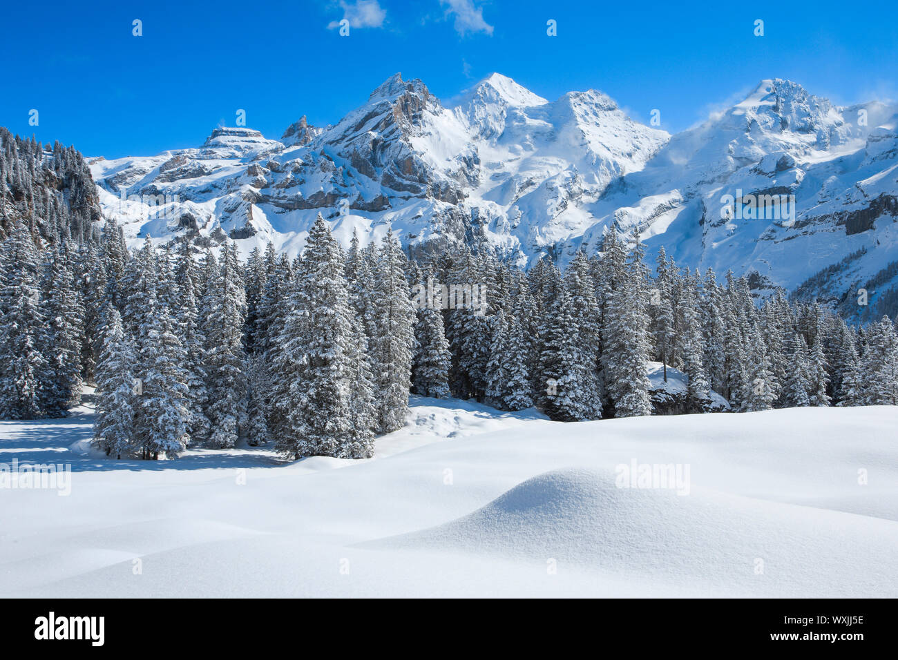 Mountain massif Bluemlisalp with Rothorn, Bluemlisalphorn and Oeschinenhorn. Bernese Alps, Stock Photo