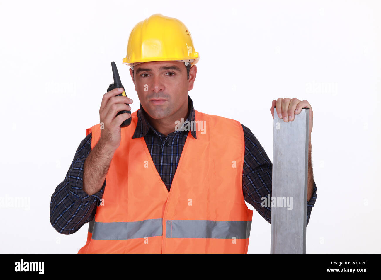 Construction worker transmitting radio Stock Photo Alamy