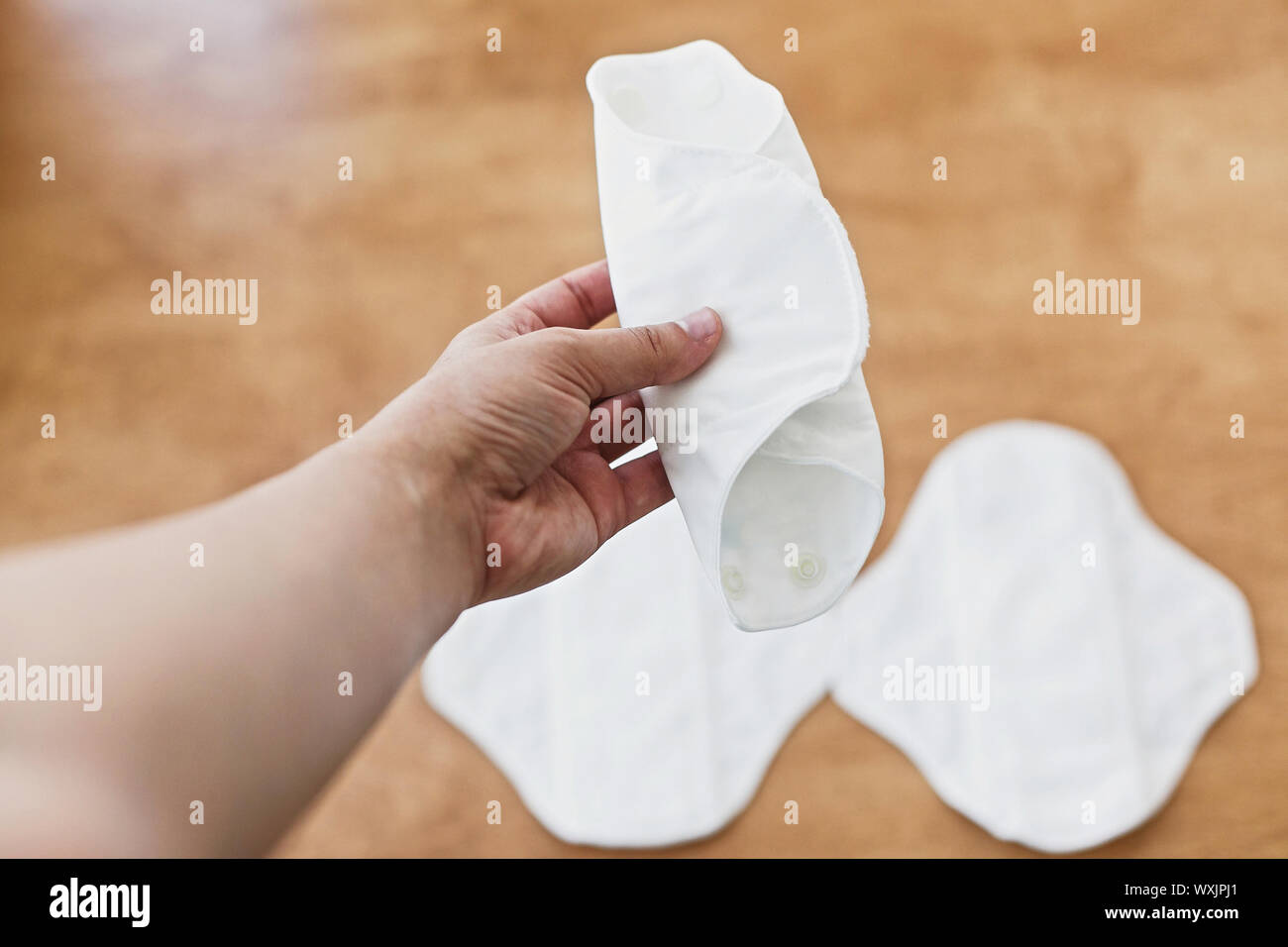 Reusable eco natural pads. White feminine washable, healthy and eco