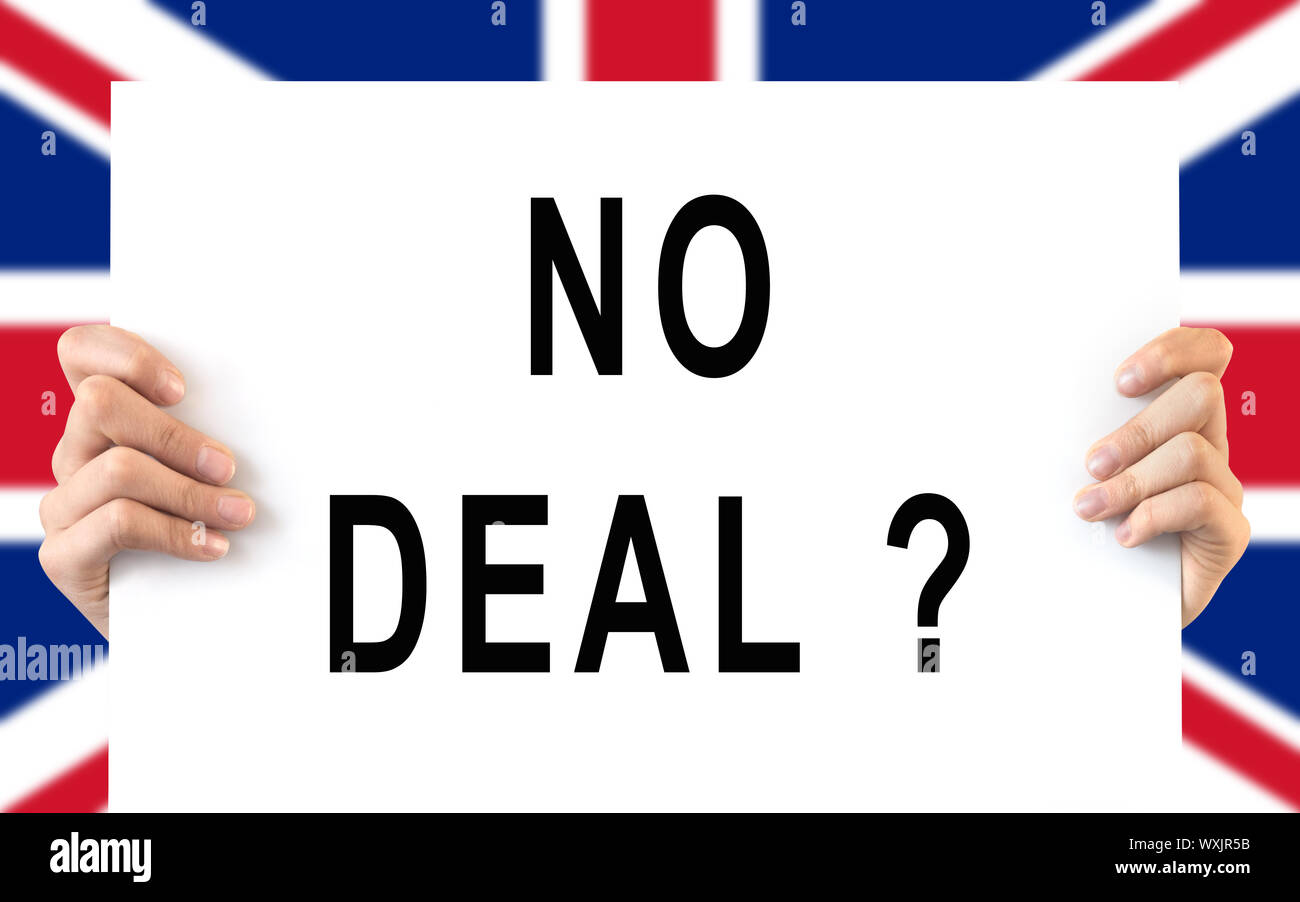 Hands holding a board 'No Deal', UK flag background, brexit concept Stock Photo