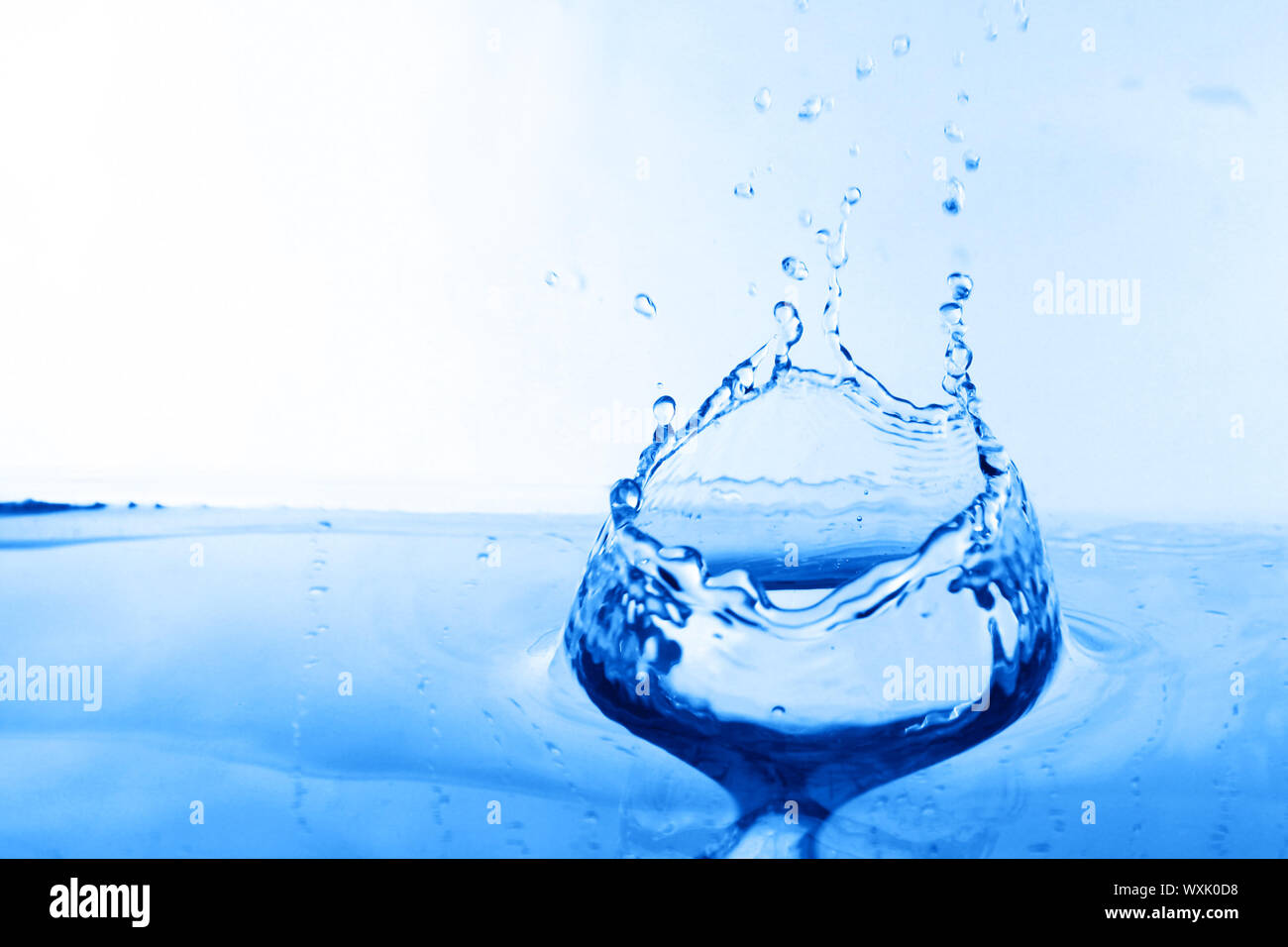 clear blue water splash on white Stock Photo - Alamy