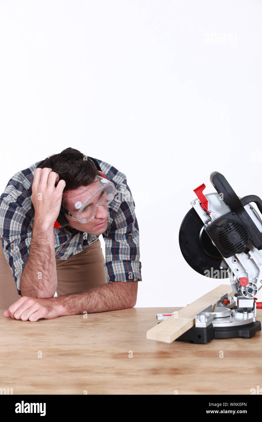 Man with a circular saw Stock Photo - Alamy