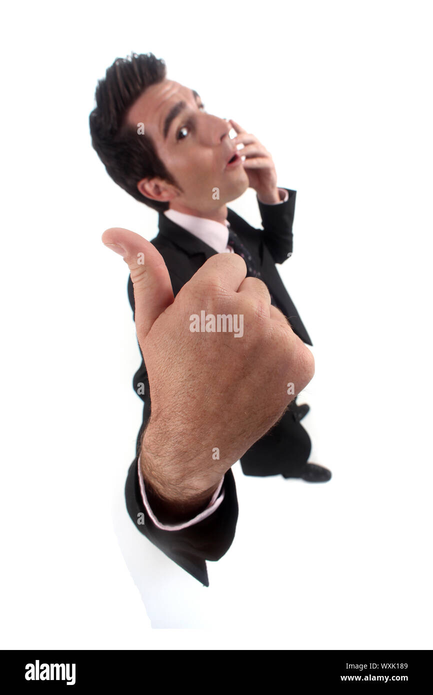 Businessman giving the thumb's up Stock Photo Alamy