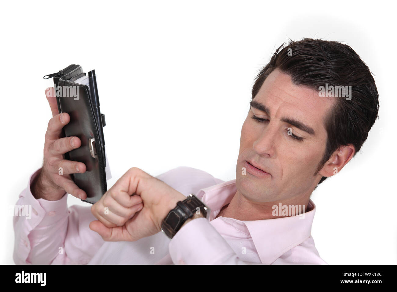 Man looking at the time Stock Photo