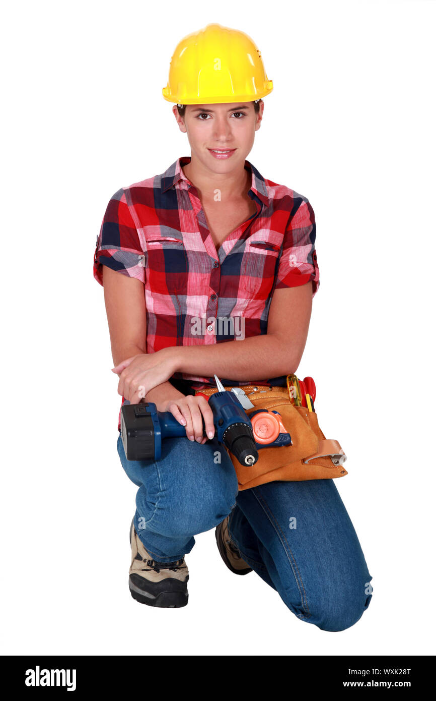craftswoman holding a drill Stock Photo - Alamy