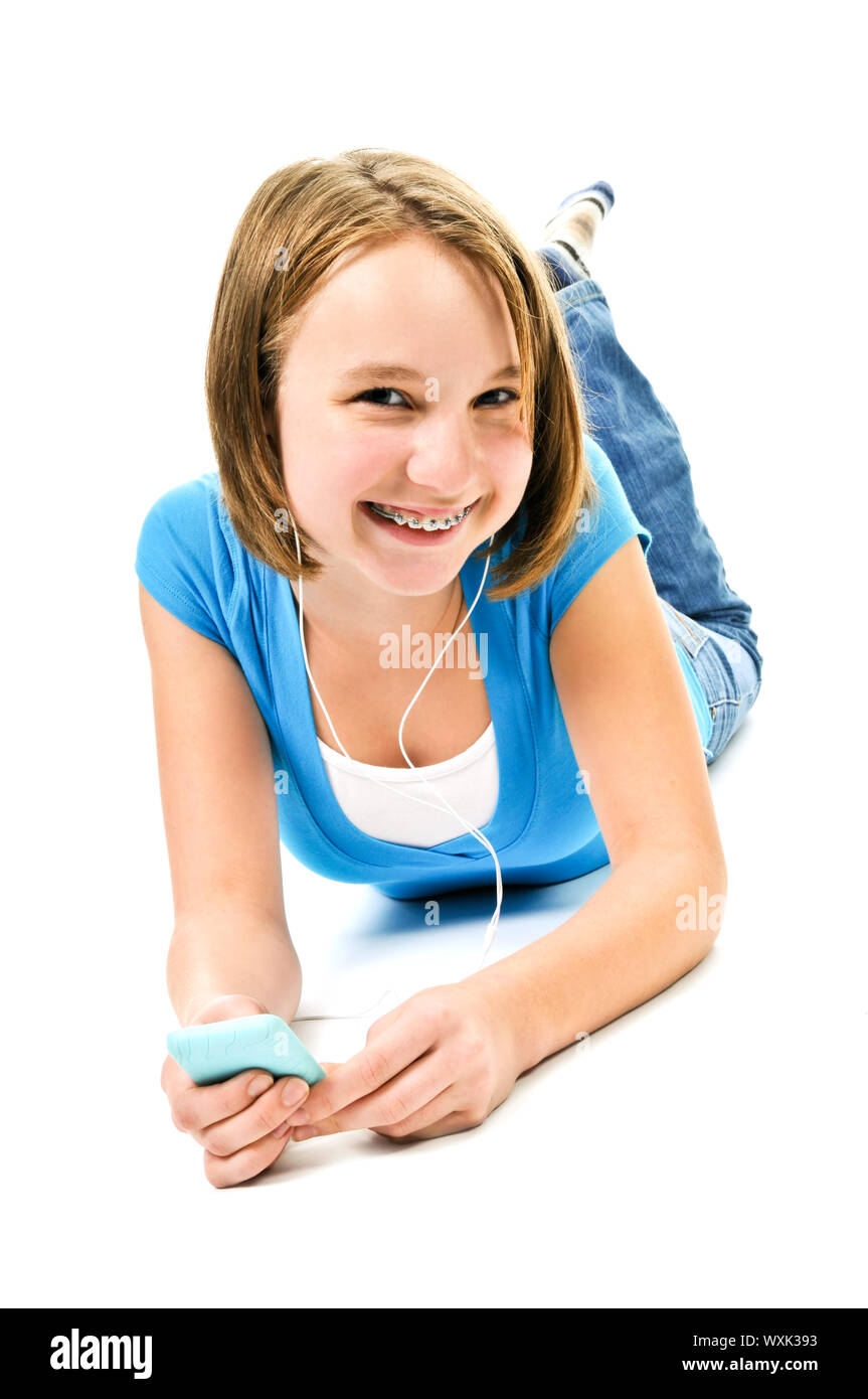 Teenage girl listening to music with her mp3 player Stock Photo Alamy
