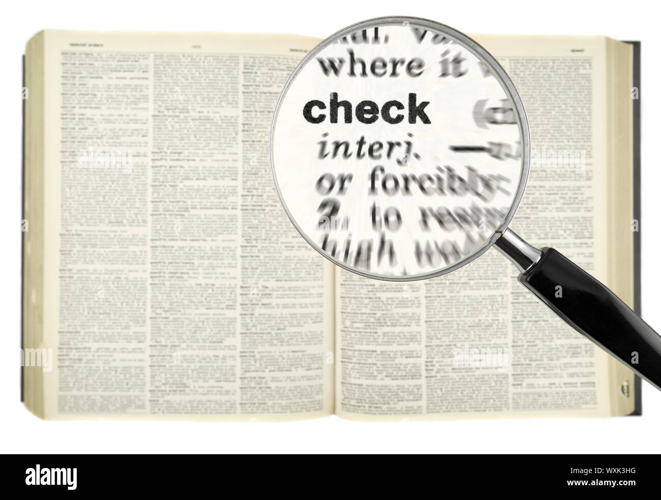 A magnifying glass on the word CHECK on a dictionary Stock Photo Alamy