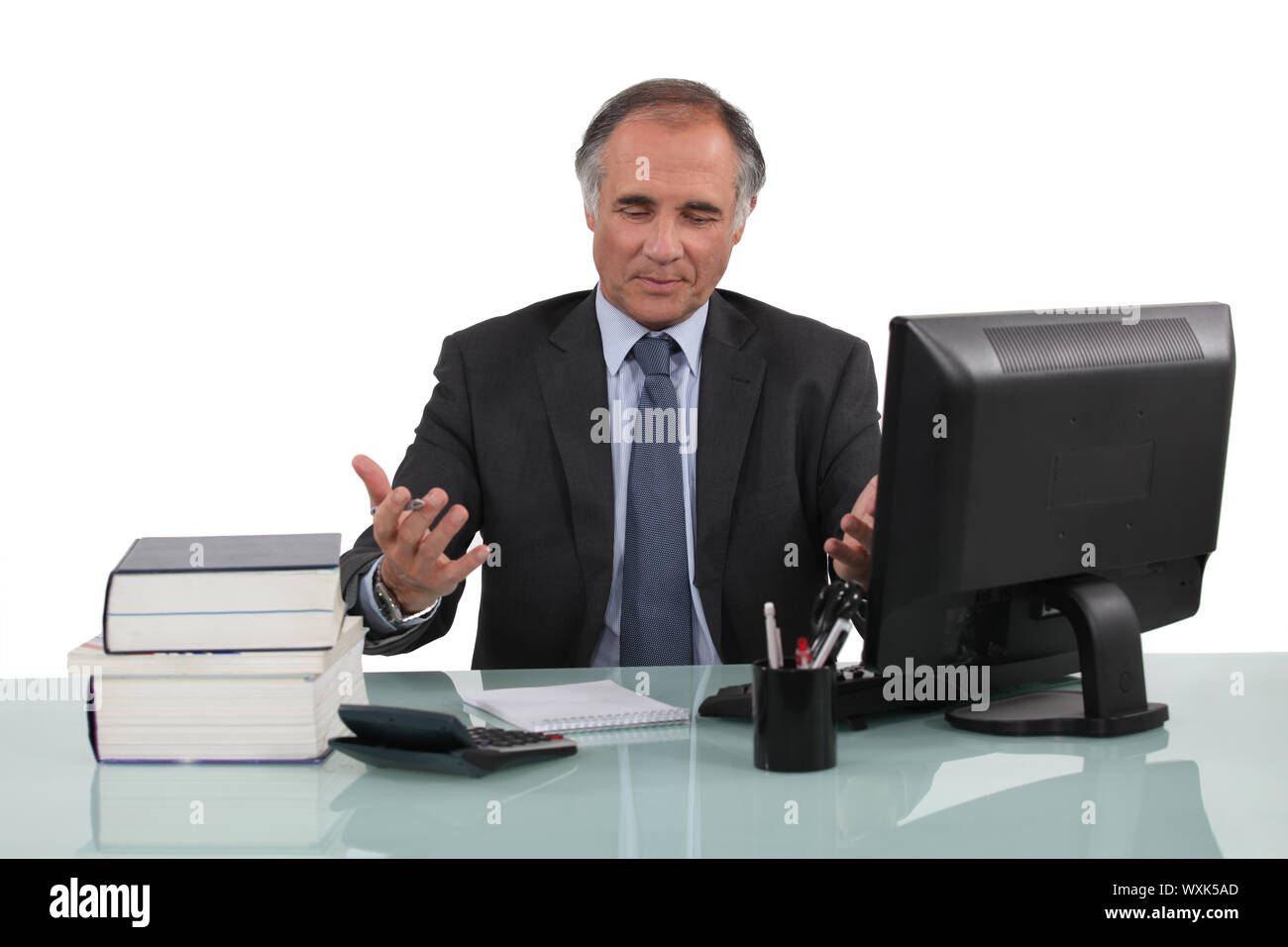 businessman working at his desk Stock Photo
