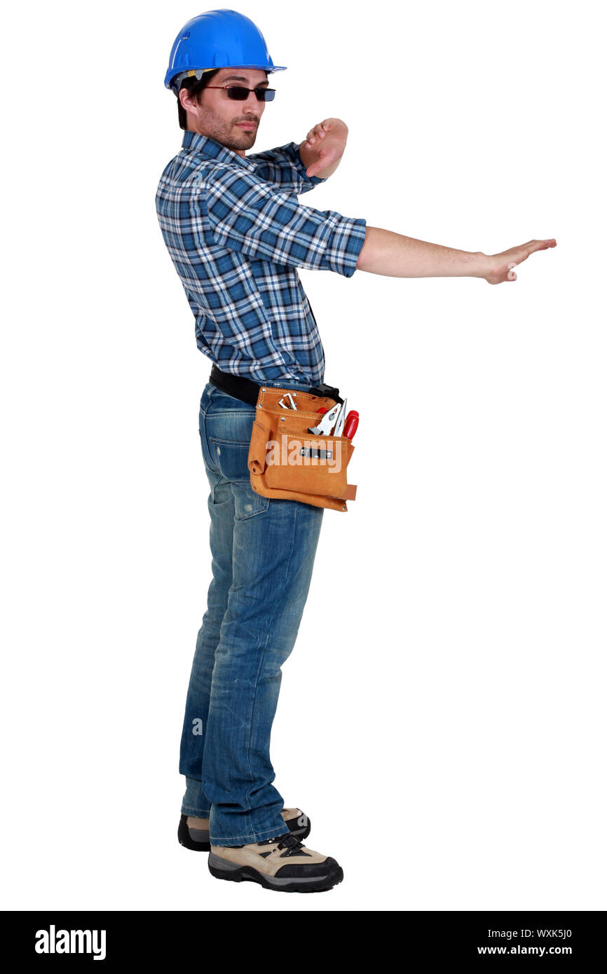 Laborer gesturing Stock Photo