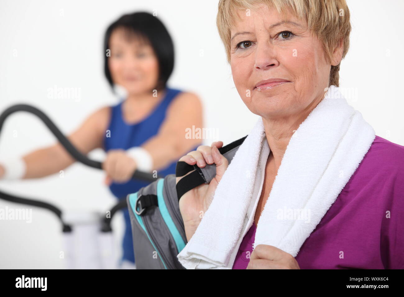 Women using gym equipment Stock Photo Alamy