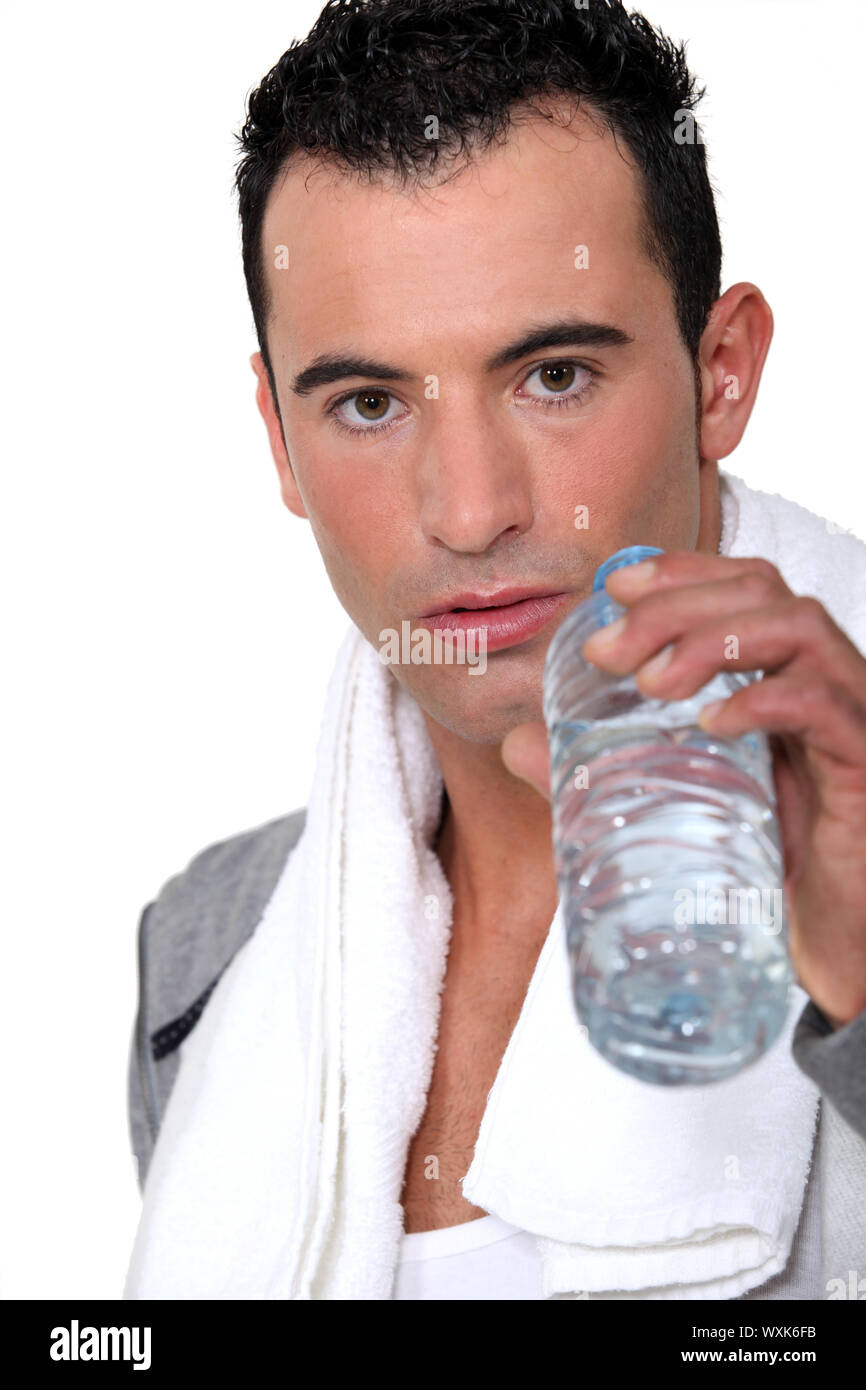 Man drinking water after workout Stock Photo Alamy