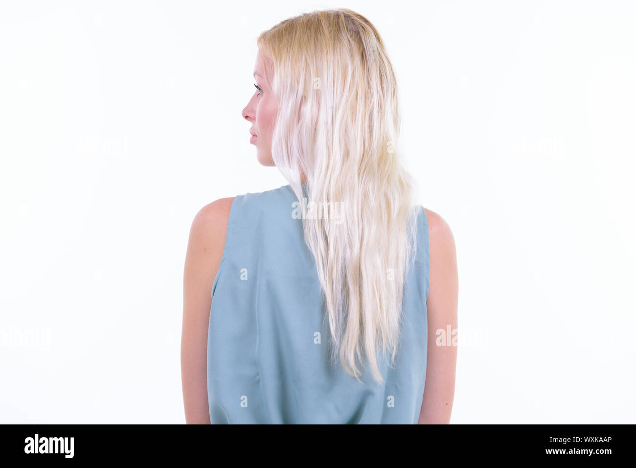 Slim blonde female rear view hi-res stock photography and images - Alamy