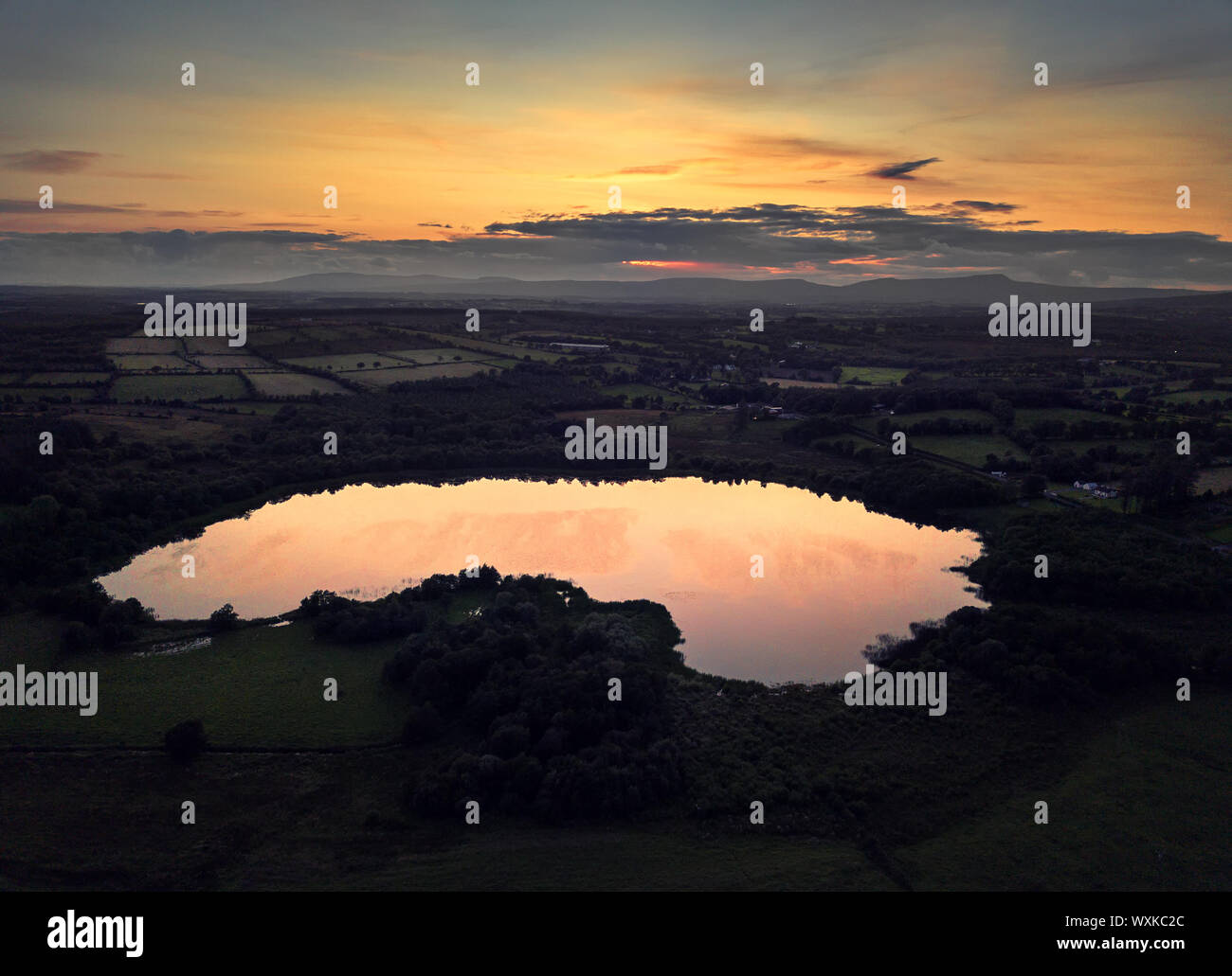 Aerial view of Clonty Lough near Ardlougher at sunset, County Cavan, Ireland Stock Photo