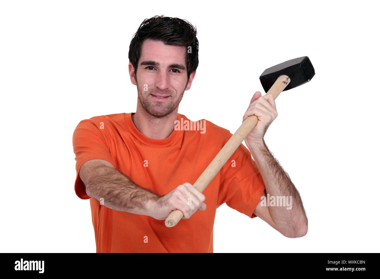 Man holding a mallet Stock Photo Alamy