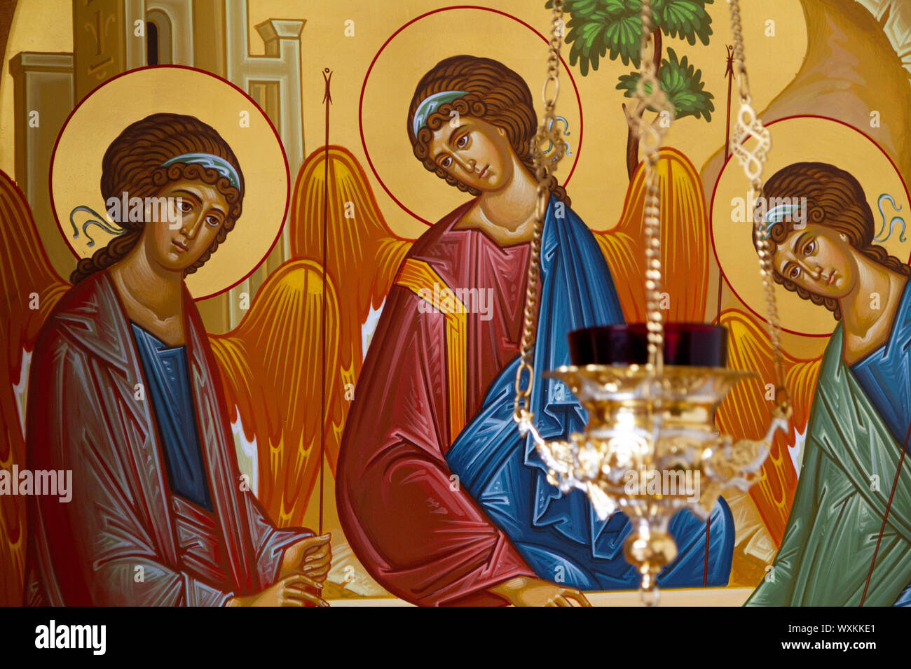 Icon of the Holy Trinity (or The Hospitality of Abraham) according to that painted by Andrei Rublev in the 15th c. Convent of the Holy Trinity. Stock Photo