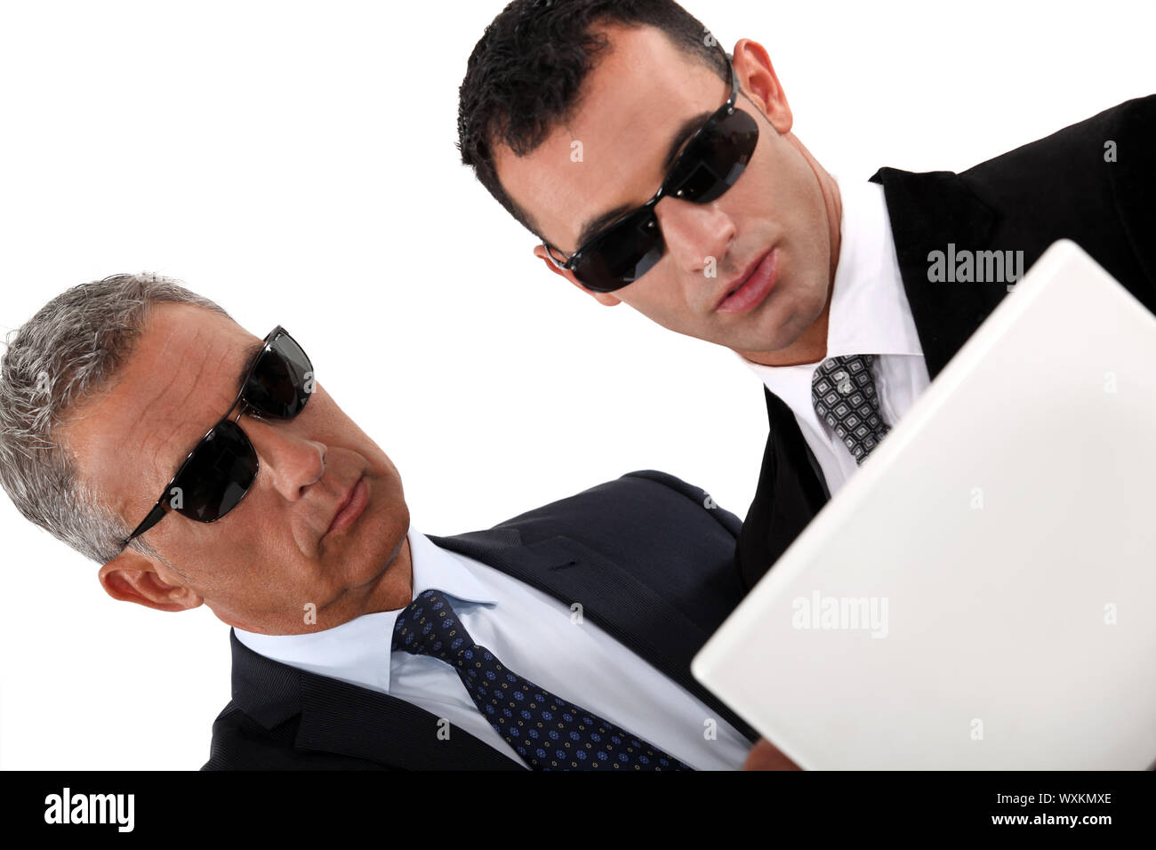 Father and son con man team Stock Photo