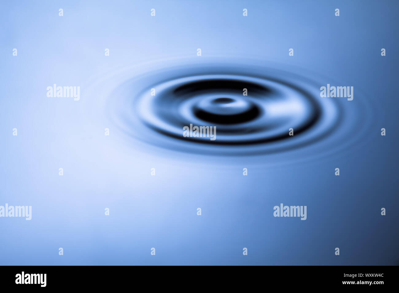Blue water with ripple effect Stock Photo - Alamy