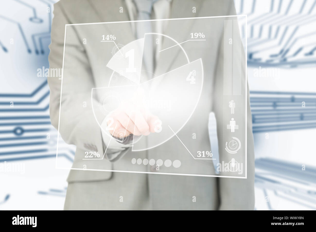 Businessman using transparent futuristic interface with circuit board background Stock Photo