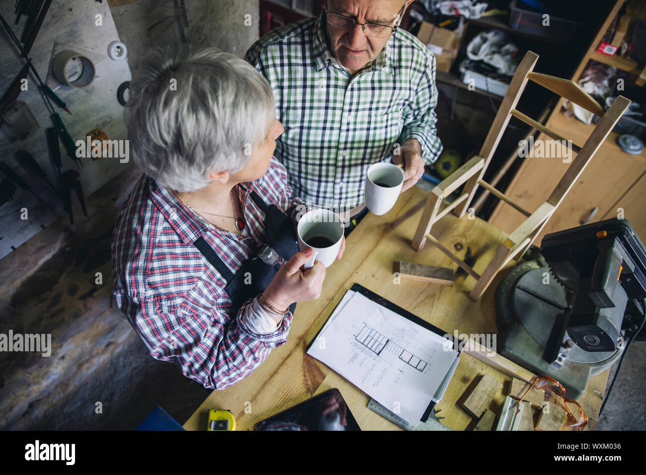 Senior couple in their carpentry Stock Photo