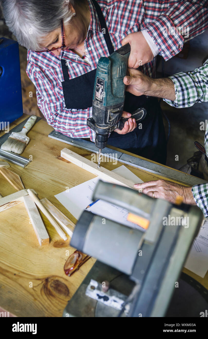 Senior couple in a carpentry Stock Photo