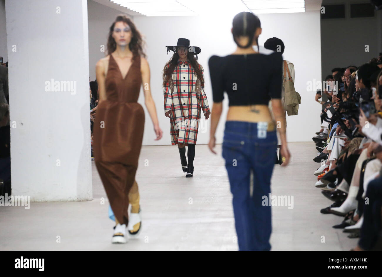 Models on the catwalk of pushBUTTON Spring/Summer 2020 London Fashion Week show at the BFC Show Space, London. Stock Photo