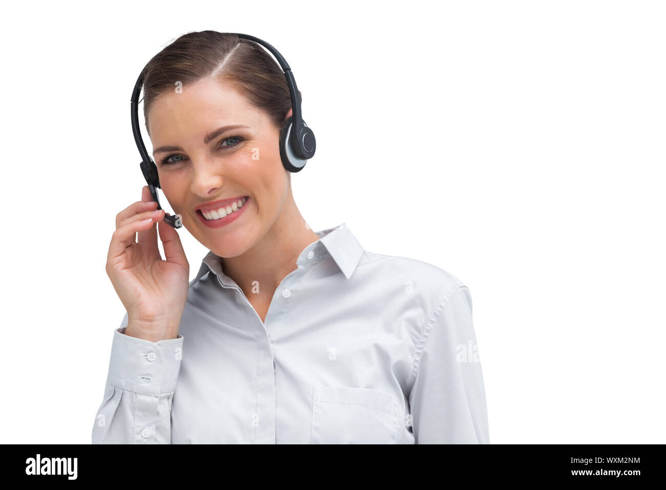 Smiling customer service agent with headset looking at the camera Stock ...