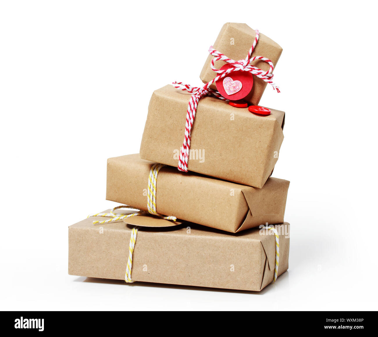 Stack of handcraft gift boxes on white background Stock Photo