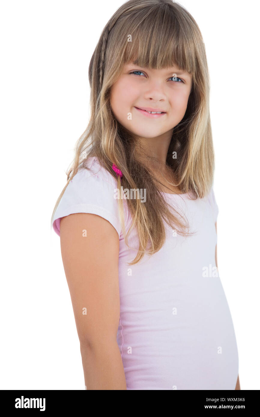 Beautiful little girl smiling on white background Stock Photo - Alamy