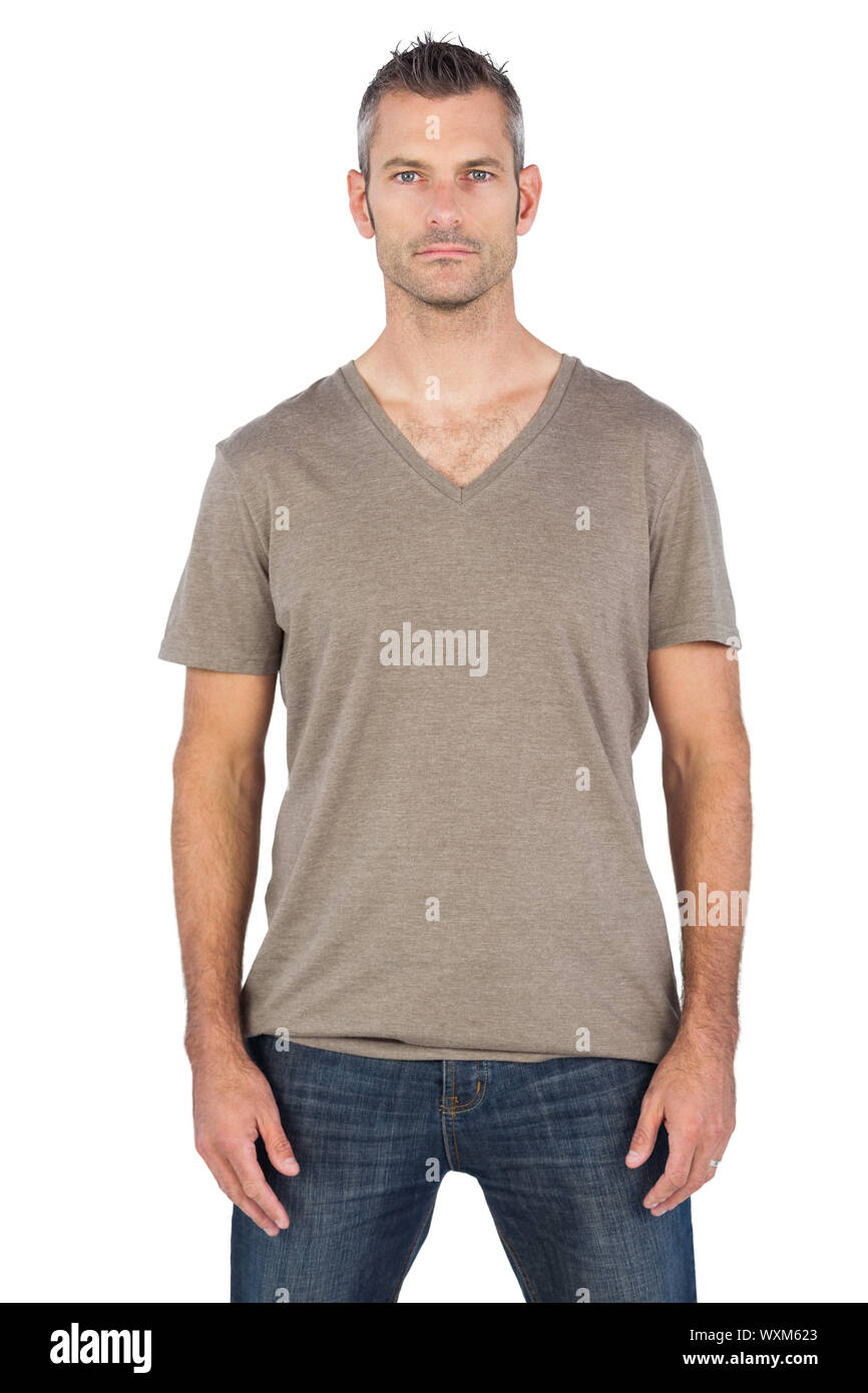 Serious man looking at the camera on a white background Stock Photo - Alamy