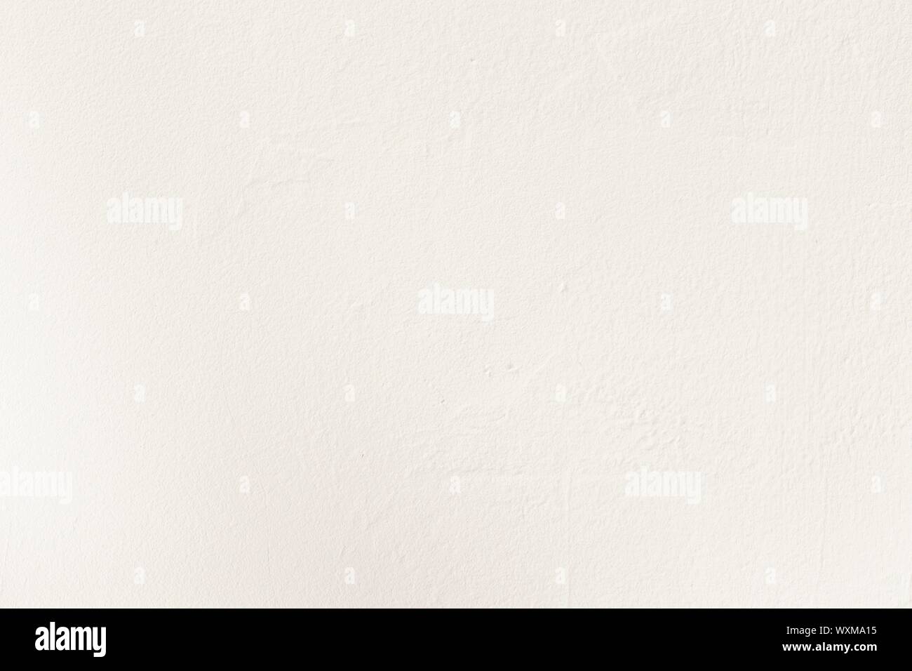 Cream rough wall texture or painted background Stock Photo