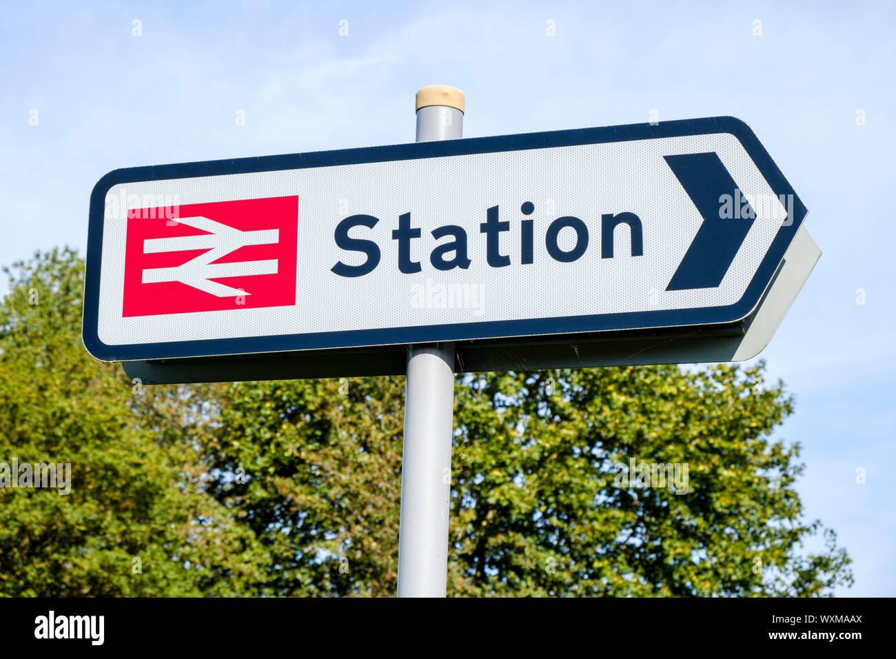 Train station directional sign for road users giving the direction to a railway station, England, UK Stock Photo