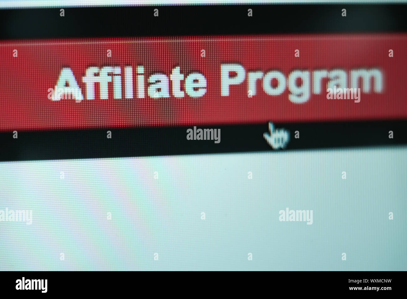 Close up Red button affiliate program on a  white background. Stock Photo