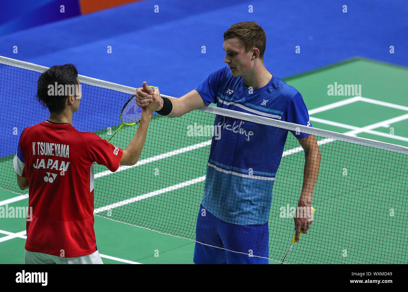 Changzhou, China's Jiangsu Province. 17th Sep, 2019. Viktor Axelsen (R) of  Denmark shakes hands with Kanta Tsuneyama of Japan during the men's singles  first round match at China Open 2019 badminton tournament