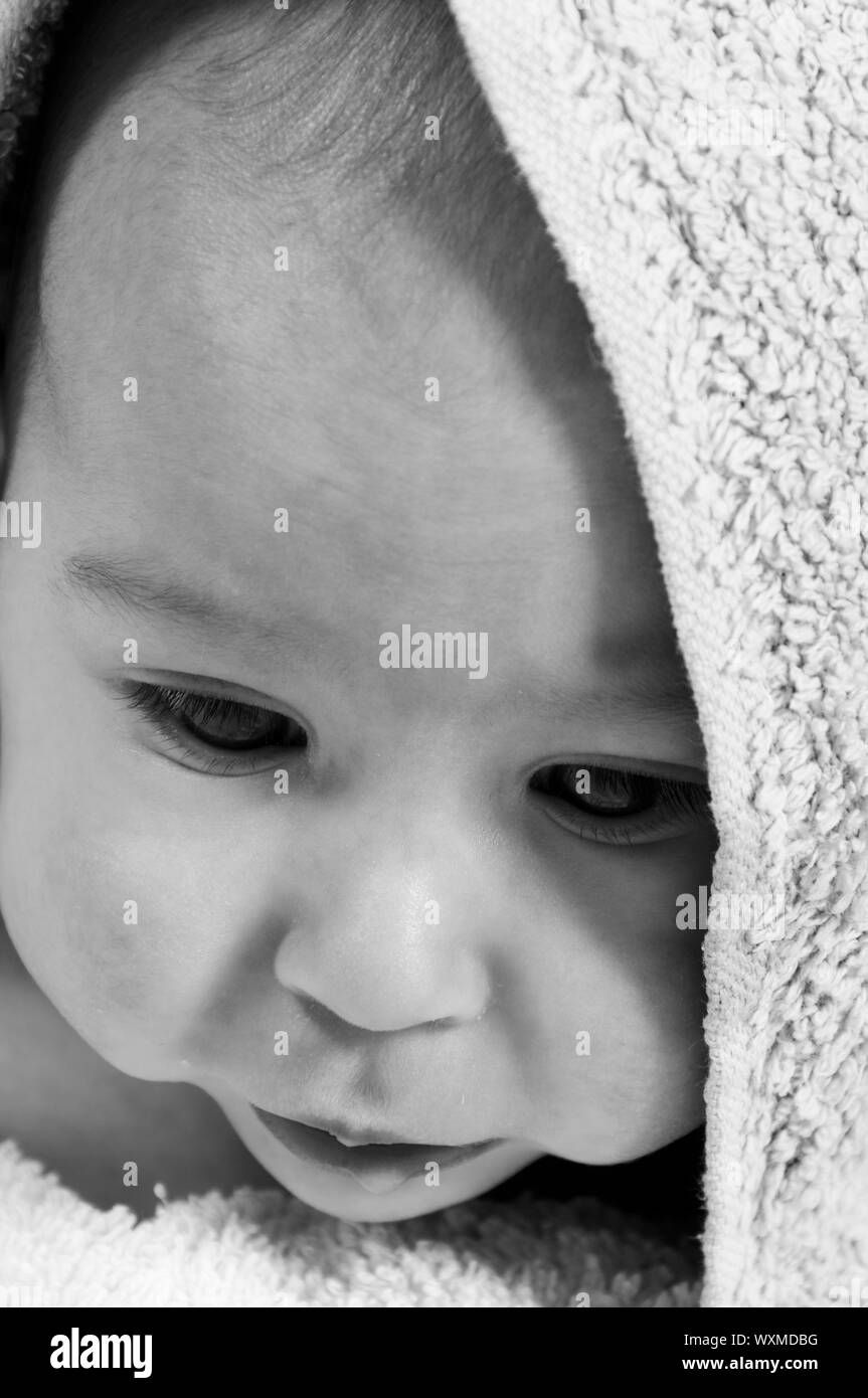 Sad baby in black and white Stock Photo