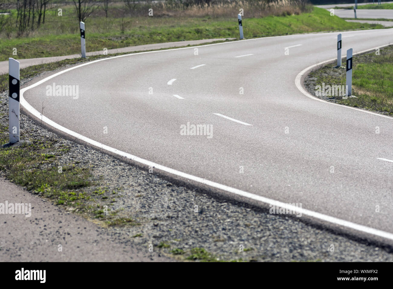 New asphalt road with curves and bump Stock Photo