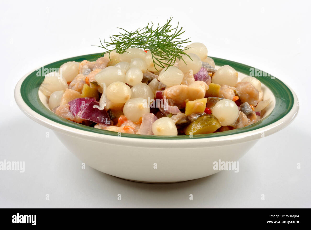 some fresh organic herring salad in a bowl Stock Photo - Alamy