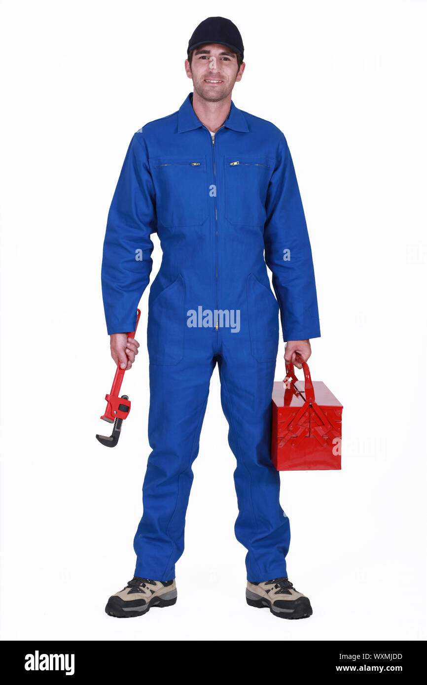 Plumber arriving at work Stock Photo