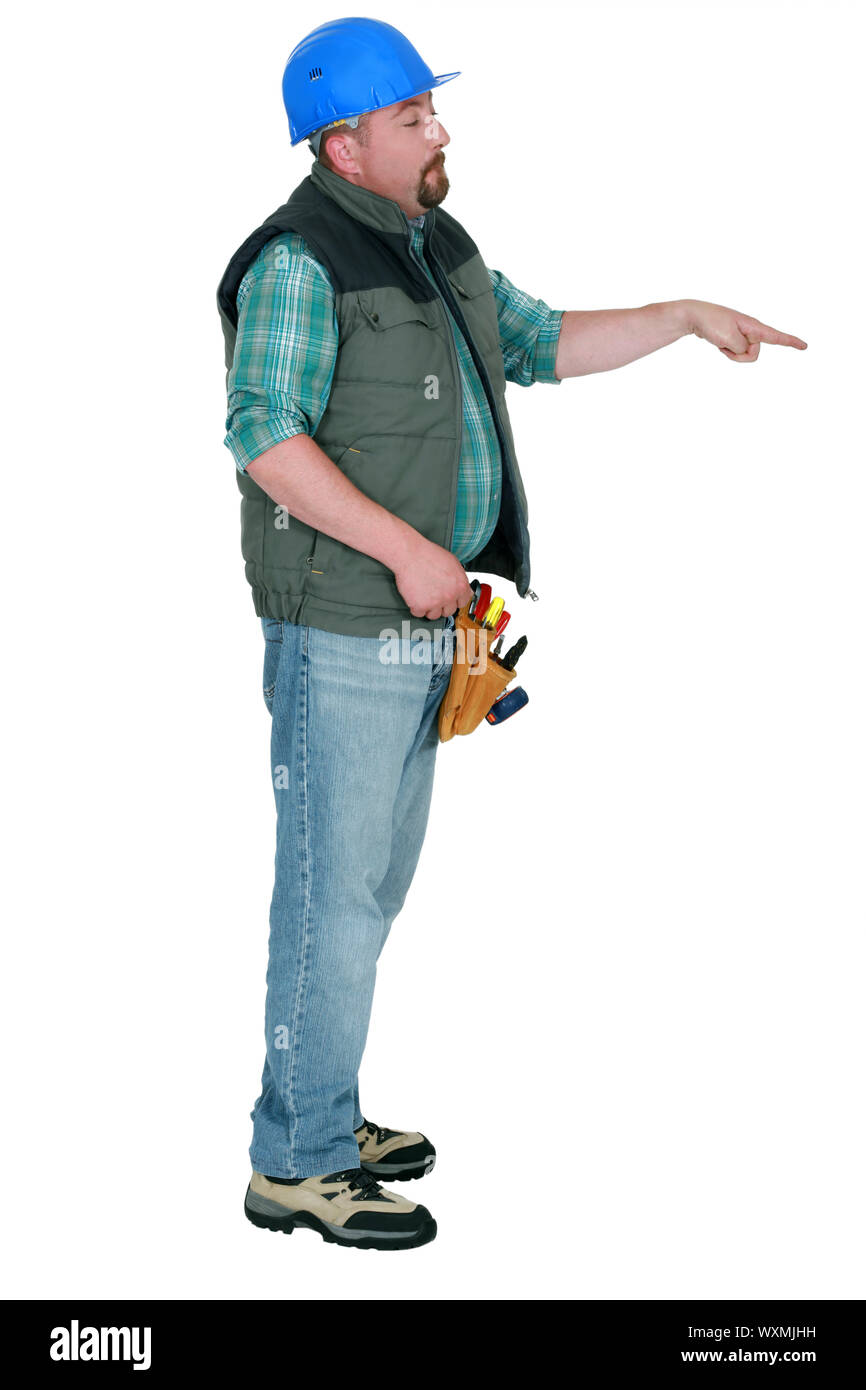 Laborer gesturing on white background Stock Photo