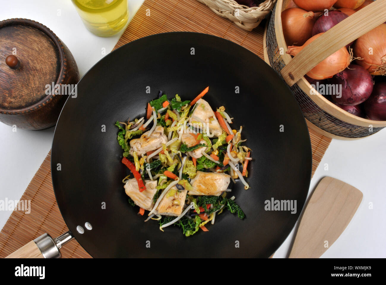 grilled chicken with stir fry in a wok Stock Photo - Alamy