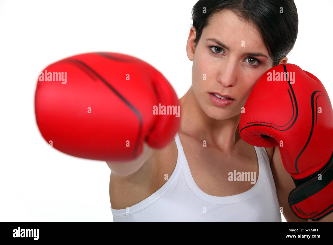 Woman with boxing gloves Stock Photo
