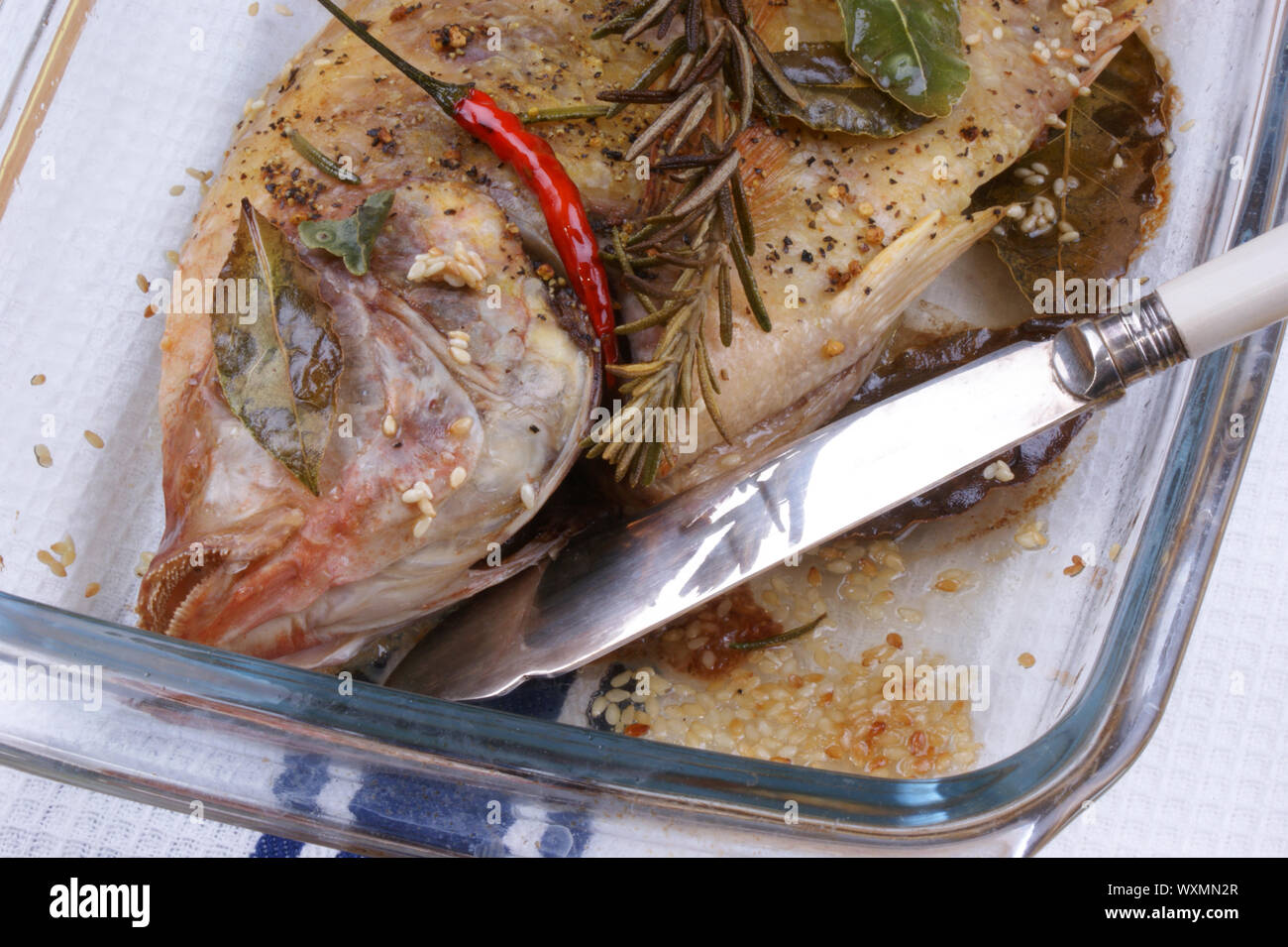 grilled tilapia with spices ready to eat Stock Photo Alamy
