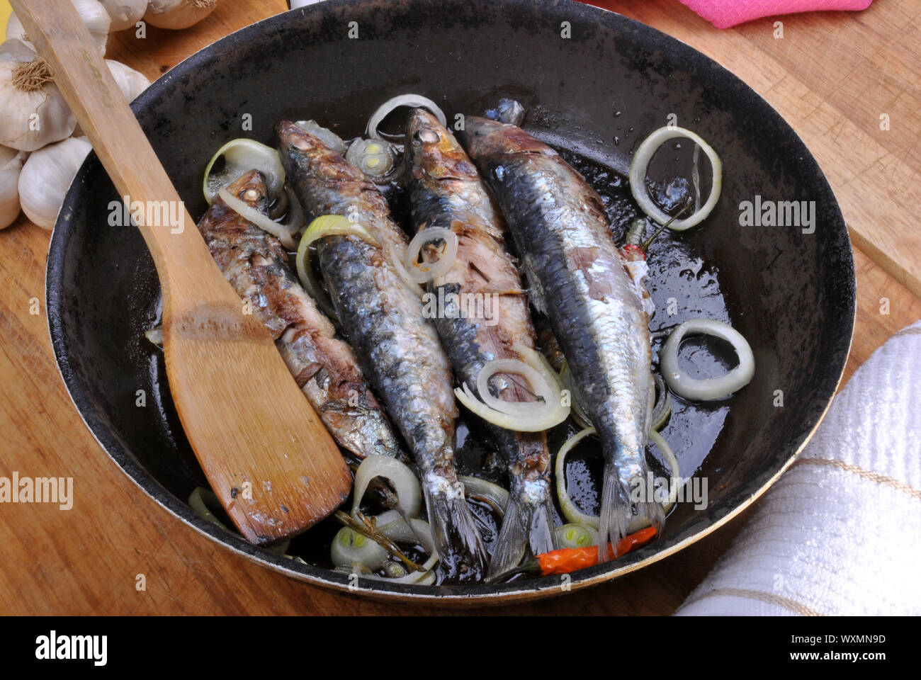 grilled sardine in a pan ready to eat Stock Photo Alamy